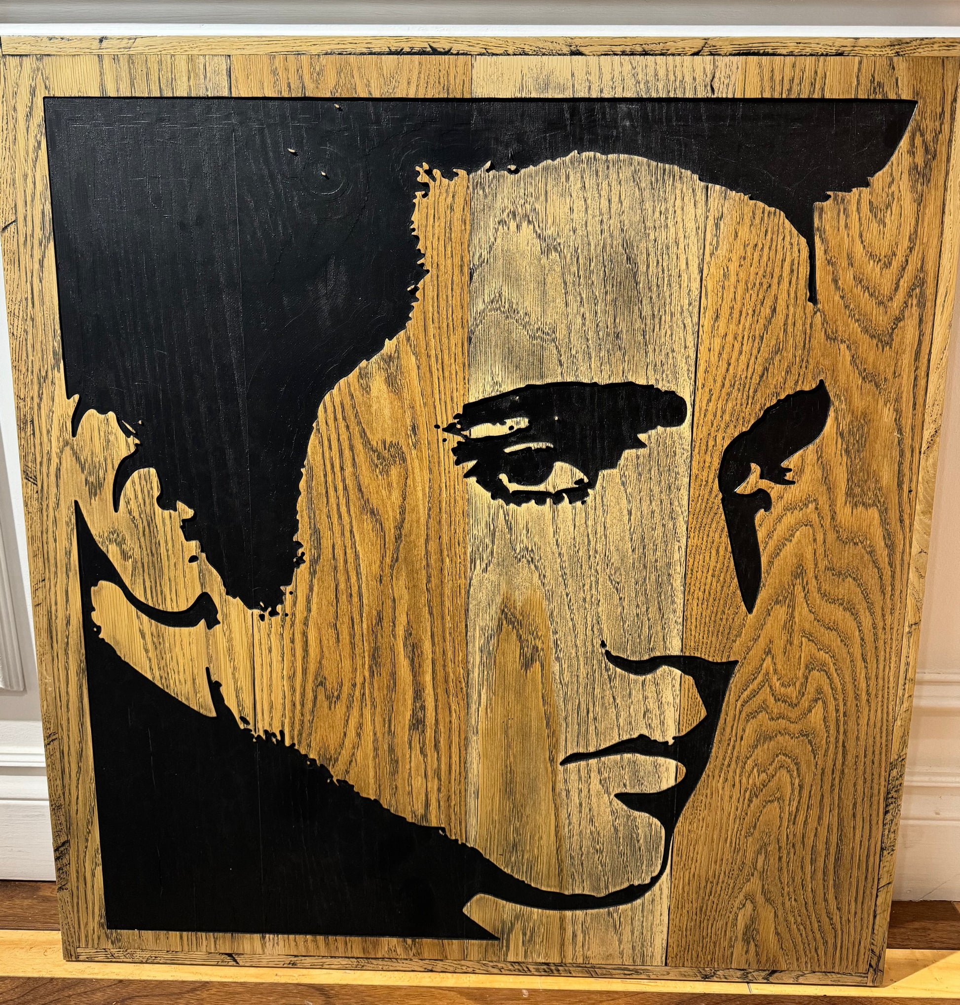 Wooden sign with profile image of Elvis